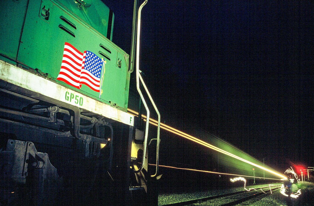 green truck with yellow light