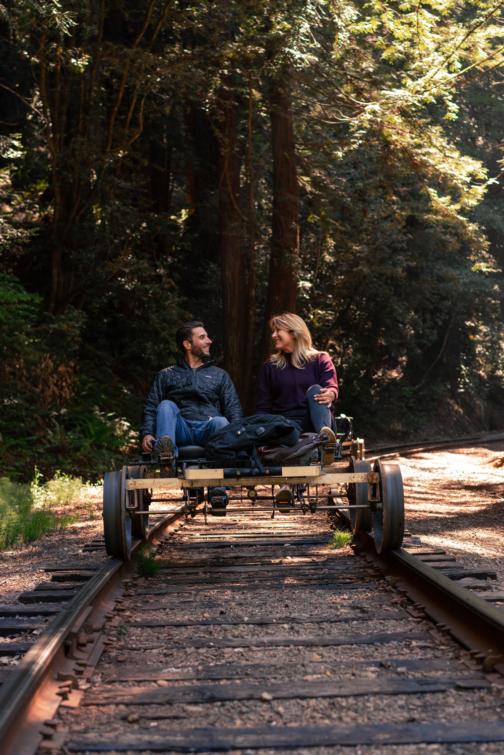 two people on railbike looking at each other