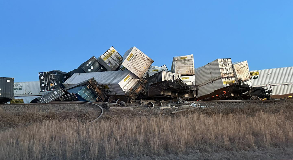 Stacks of containers and cars from derailed intermodal train
