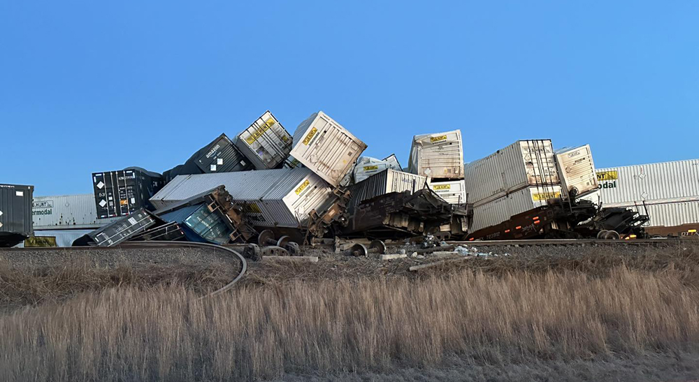 Stacks of containers and cars from derailed intermodal train
