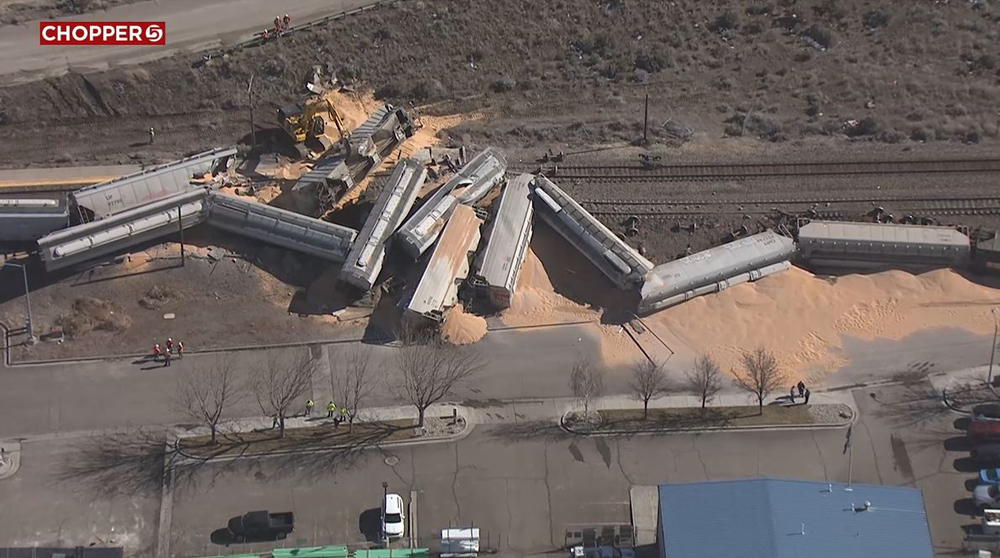 Derailed grain hoppers