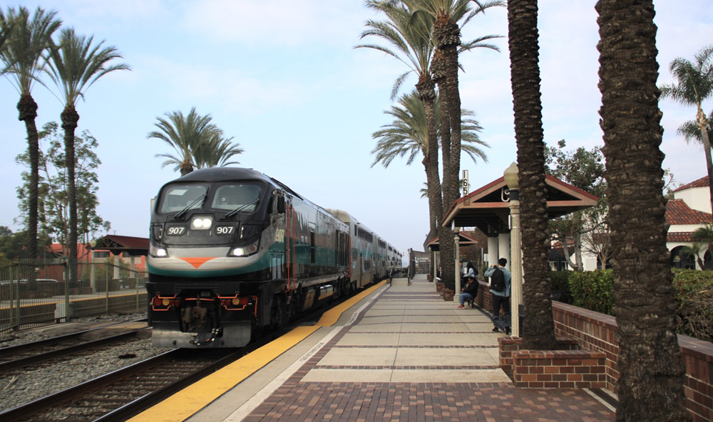 Commuter train arrives at station