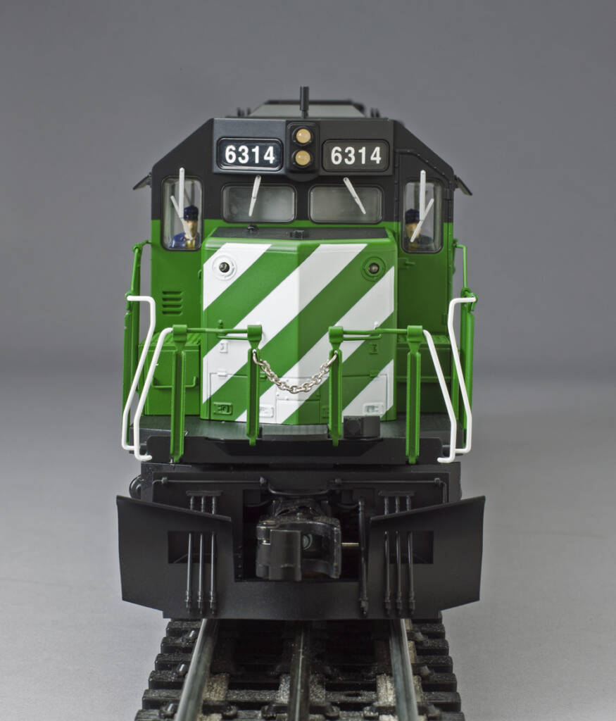 green, black, and white nose of model locomotive