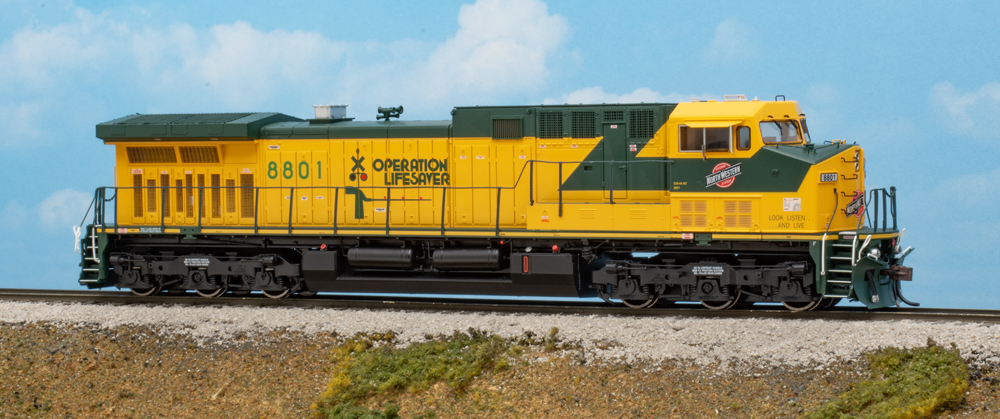 Color photo of HO scale Athearn HO General Electric AC4400CW on scenic base.
