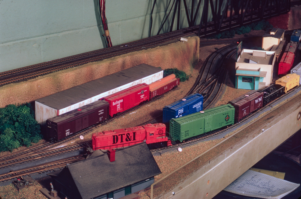 Color image of scene on HO scale model railroad.