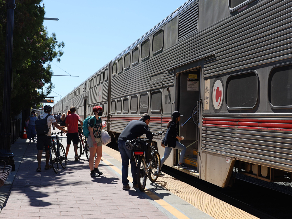 Commuter train with stainless steel bilevel cars