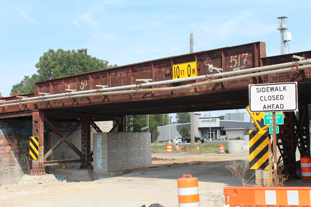 Aging girder railroad bridge over roadway