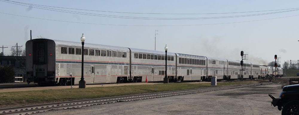 Passenger train departing station