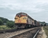 Maroon Rock Island locomotives on freight train
