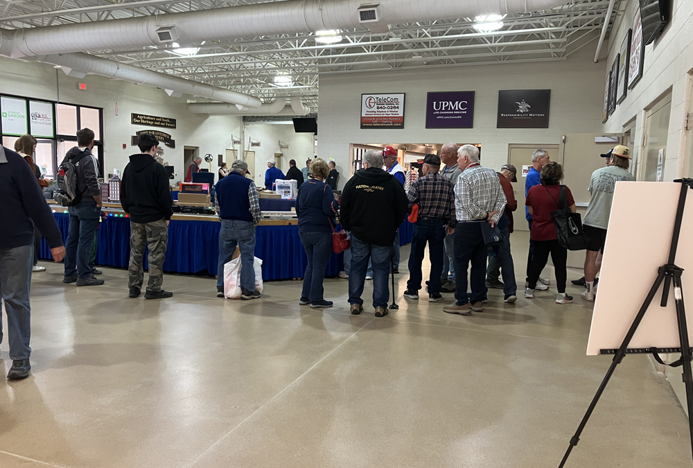 line of people waiting by door