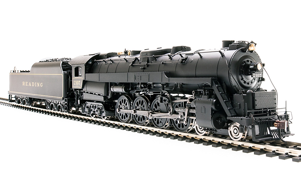 A model steam locomotive in 3/4 profile on a white background
