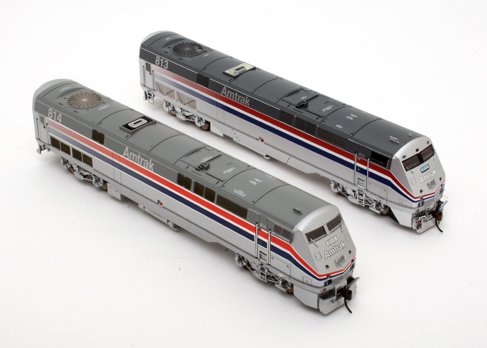 Photo showing two HO scale diesel locomotives side by side.