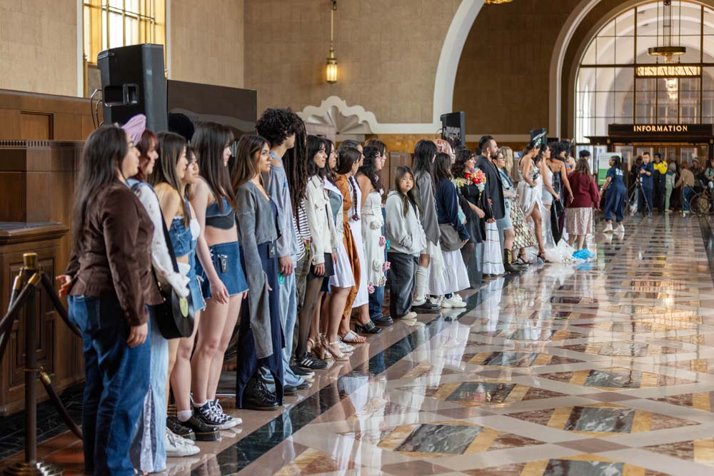 people standing in line in station