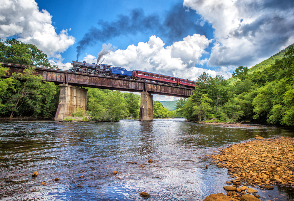 train on bridge over water