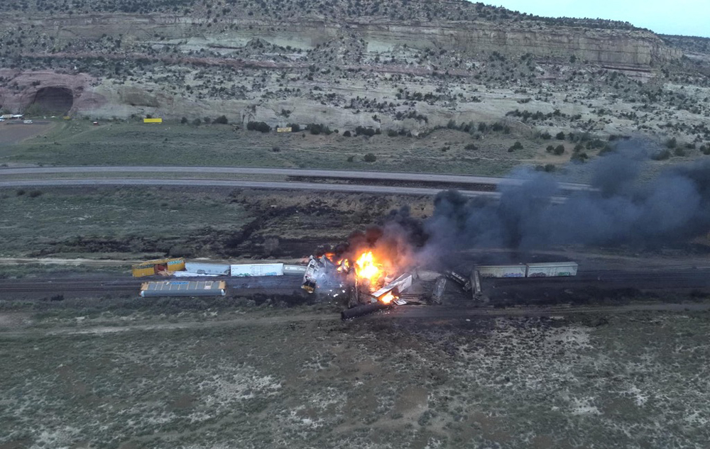 Burning railroad cars at derailment site