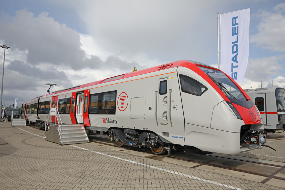 White multiple-unit trainset with red trim and "Metro" branding