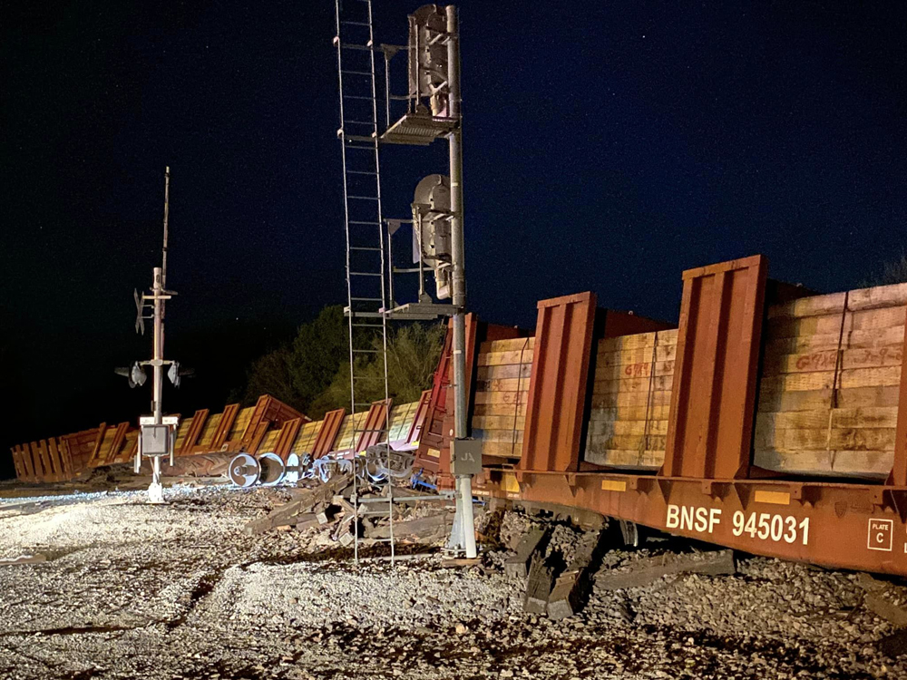 Derailed cars of railroad ties