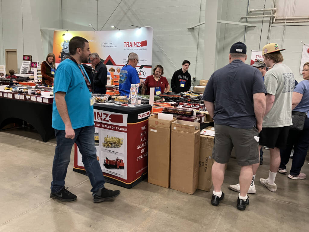 group of people near a booth