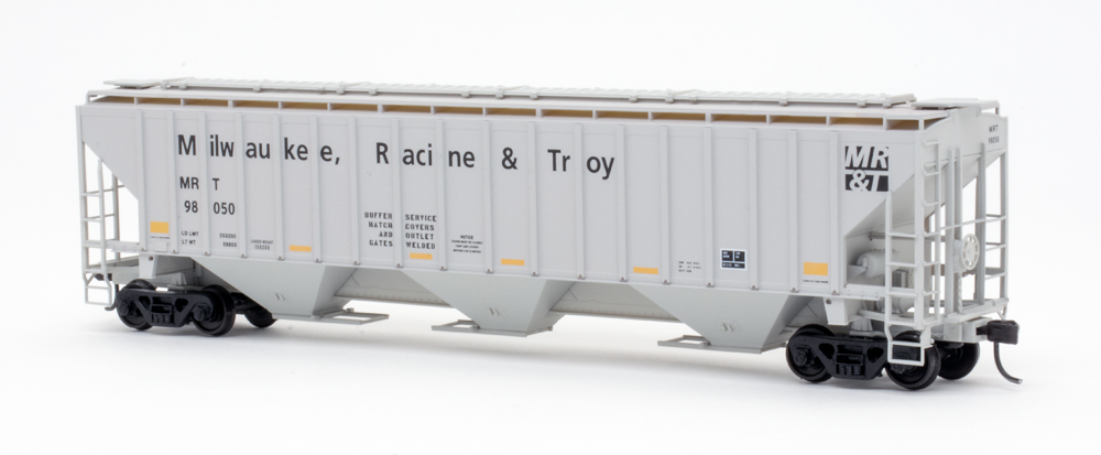 Color photo of HO scale covered hopper painted gray with black and yellow graphics.
