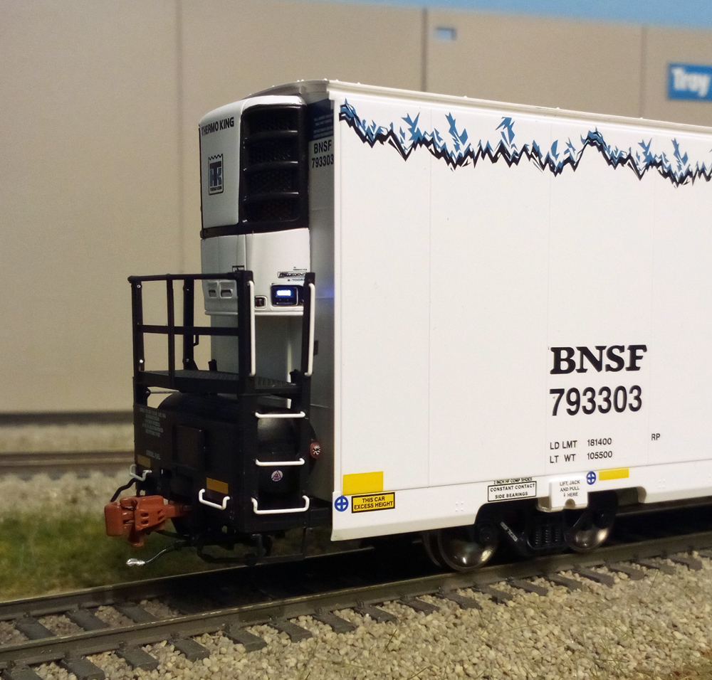Color photo showing refrigeration unit end of mechanical reefer.