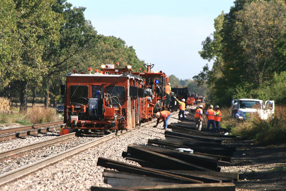 Track gang at work on long straight