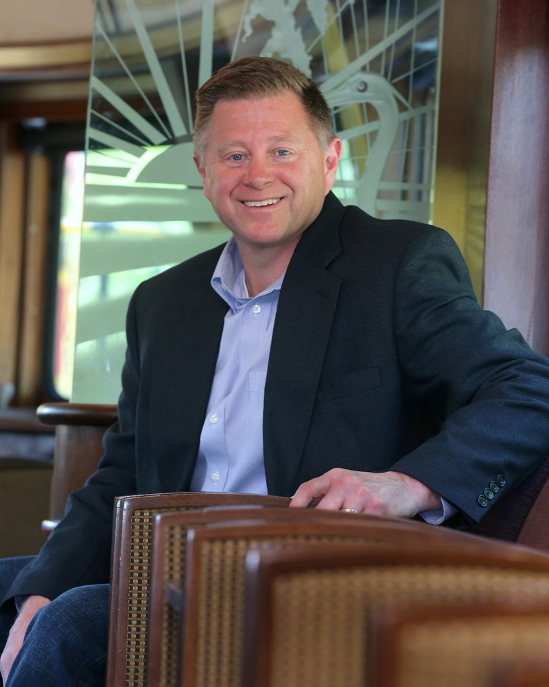 Man sitting in passenger car