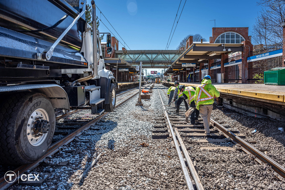 Crew working on track at rail transit station