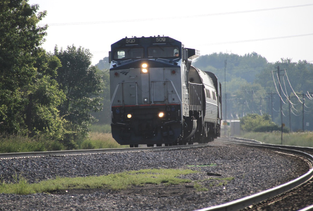Passenger train with road-switcher type locomotive