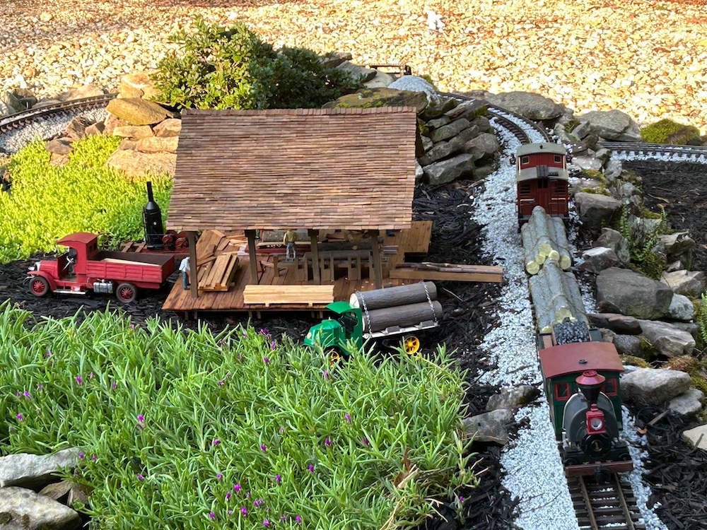 model sawmill with greenery around it