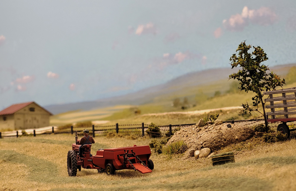 Model railroad cellphone photography tips: A model tractor on a farm on a model railroad layout