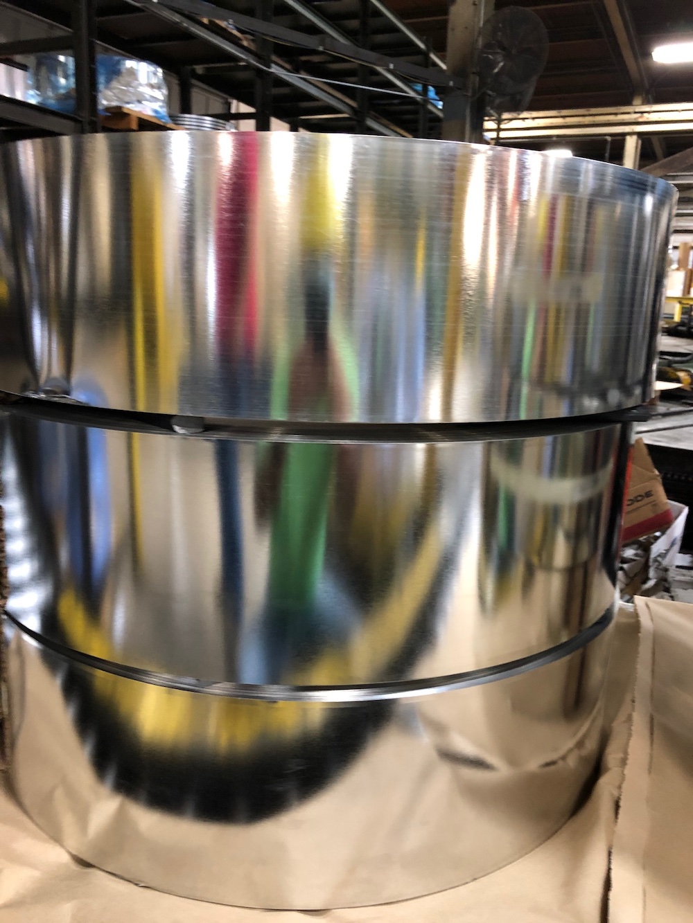 three rolls of steel