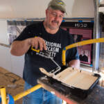 Man working inside railroad car