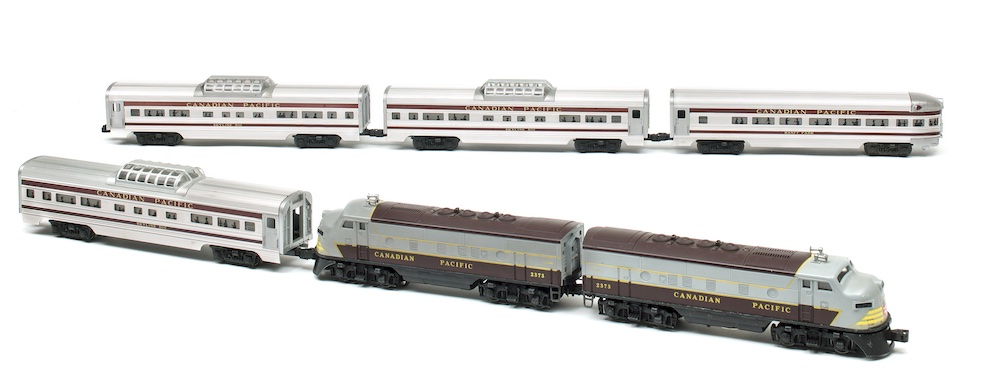 silver passenger model train set; Lionel postwar locomotive decals