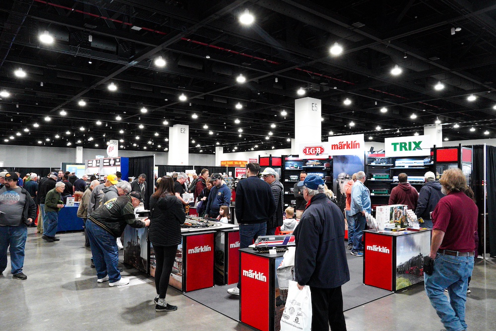 Line of vendor booths at a train show.