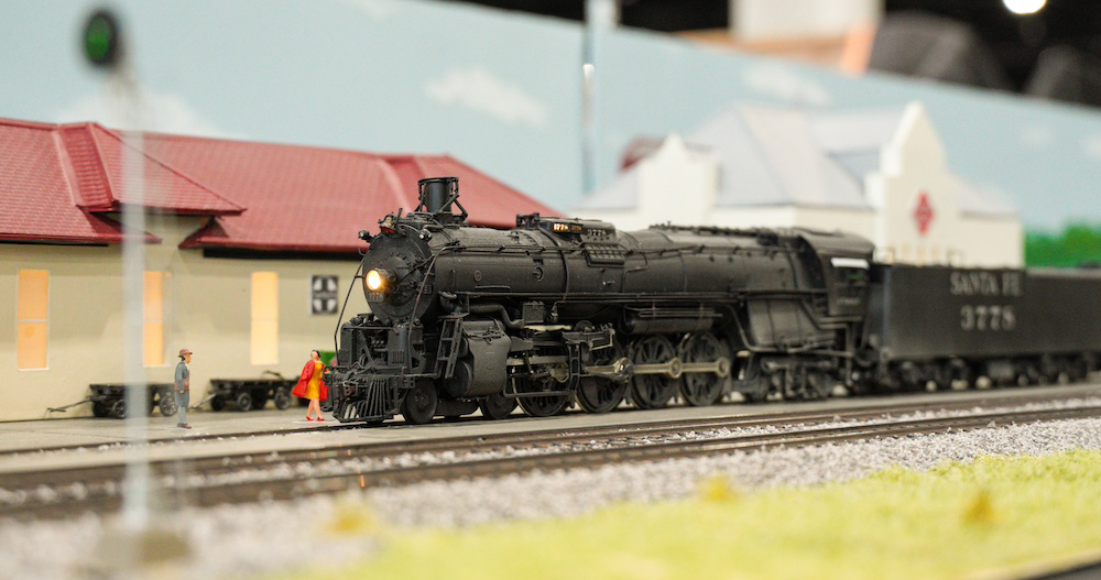 Ho scale steam locomotive at a station