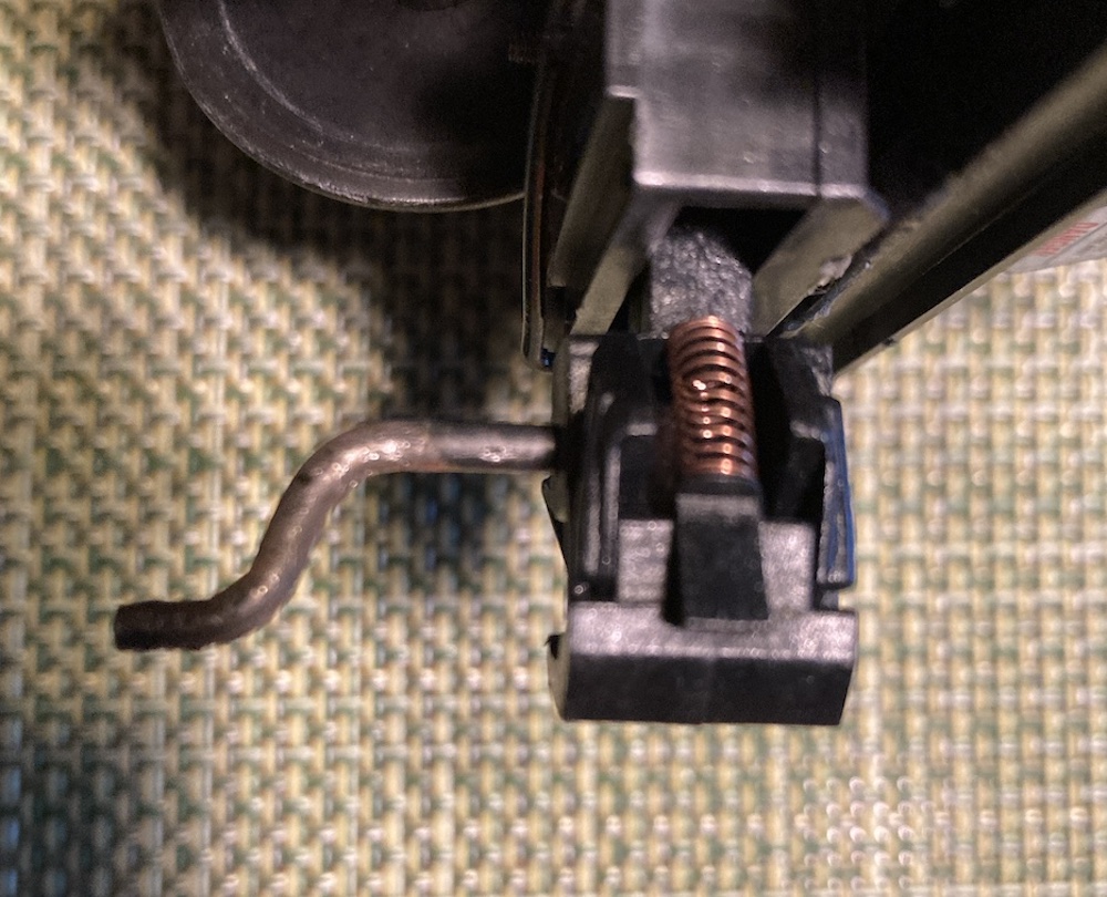 closeup of model coupler with bent glad hand