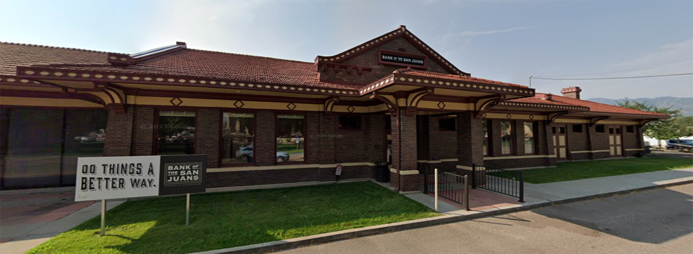 One story brick building with bank signage