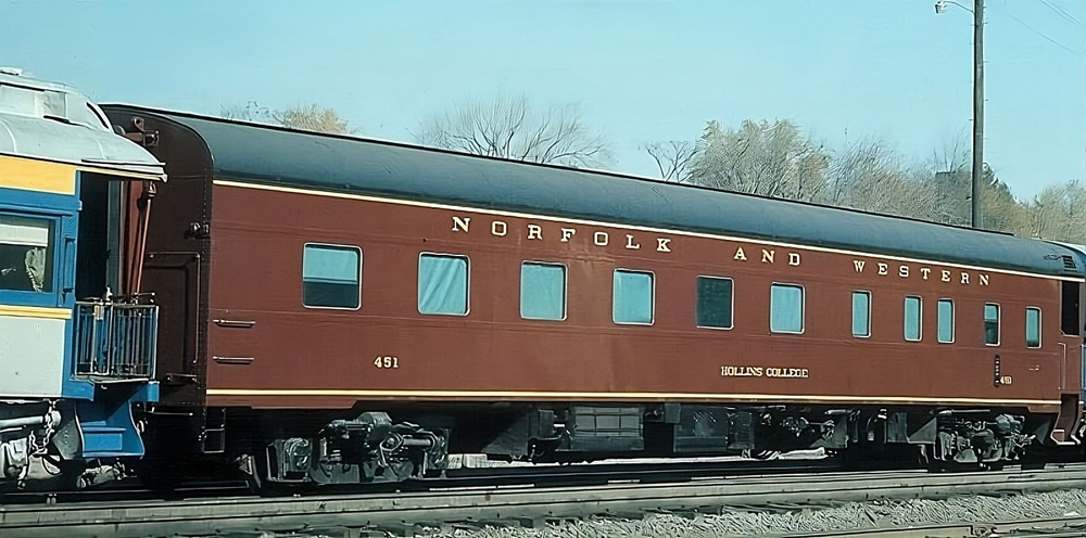 Maroon and black passenger car