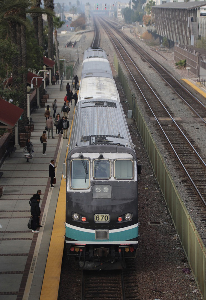 Overhead view of commuter train at station