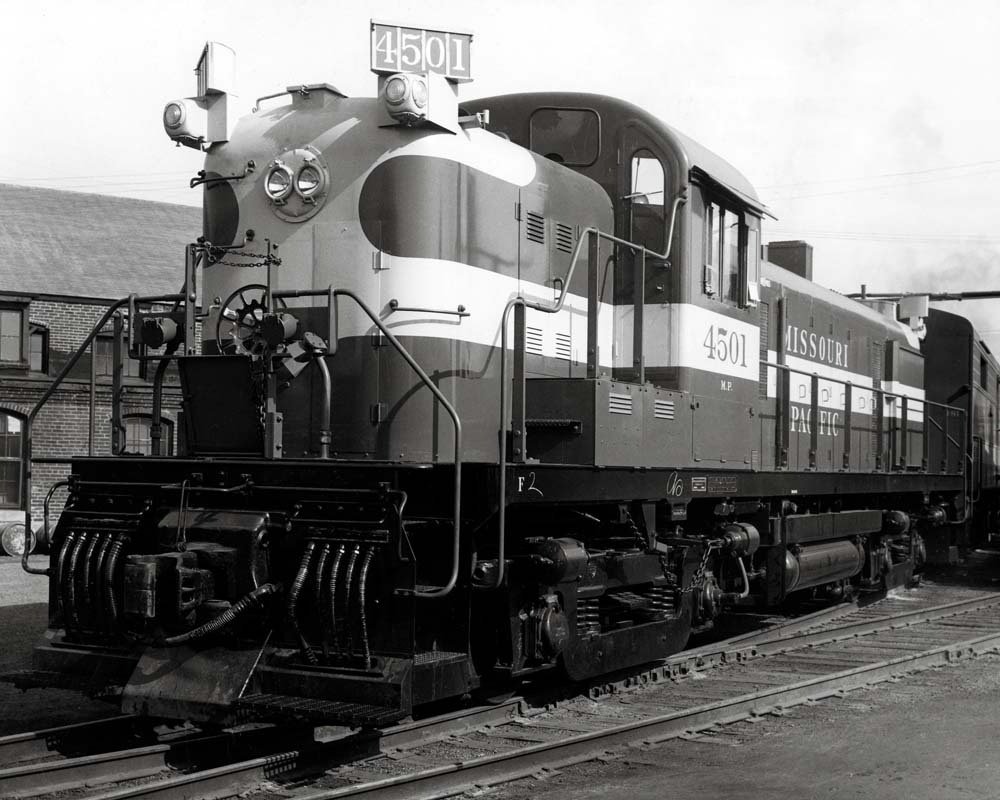 Striped mid-cab diesel locomotive
