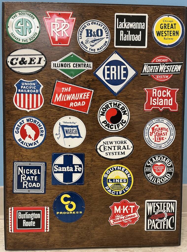 board showing railroad heralds