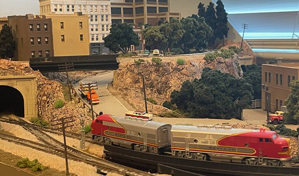 A pair of locomotives on a model railroad layout