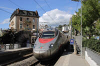 Silver and red high speed train