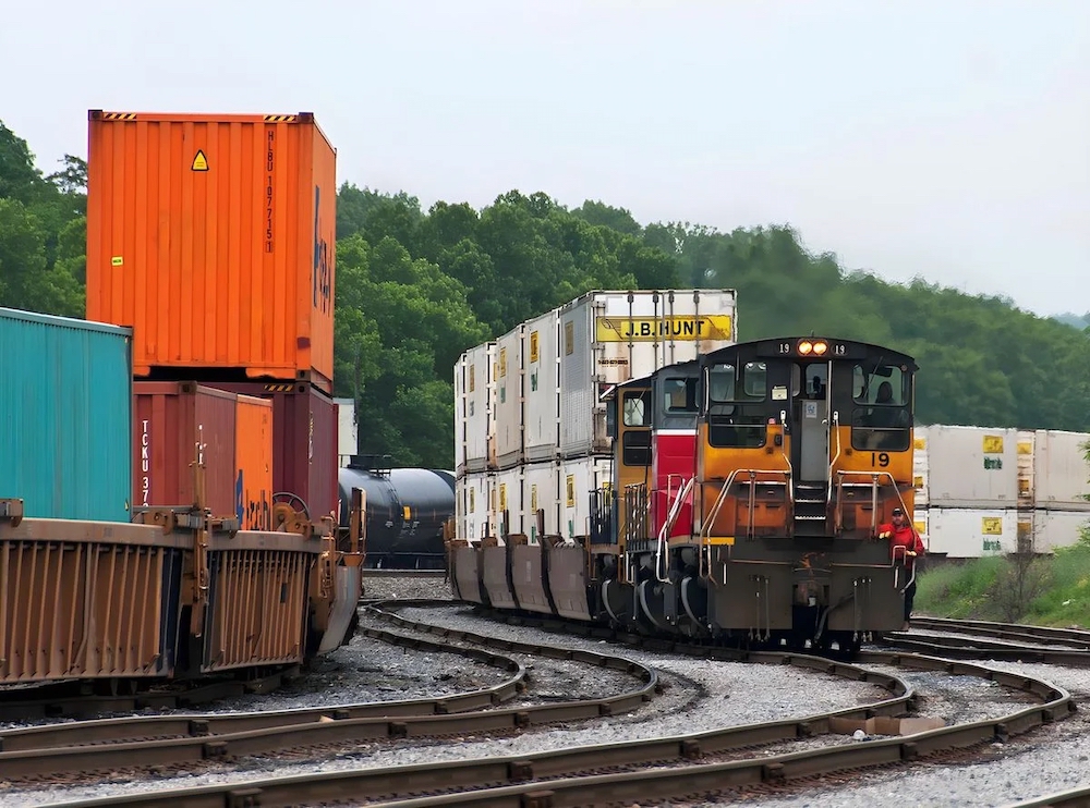 End-cab switchers moving double-stack railcars
