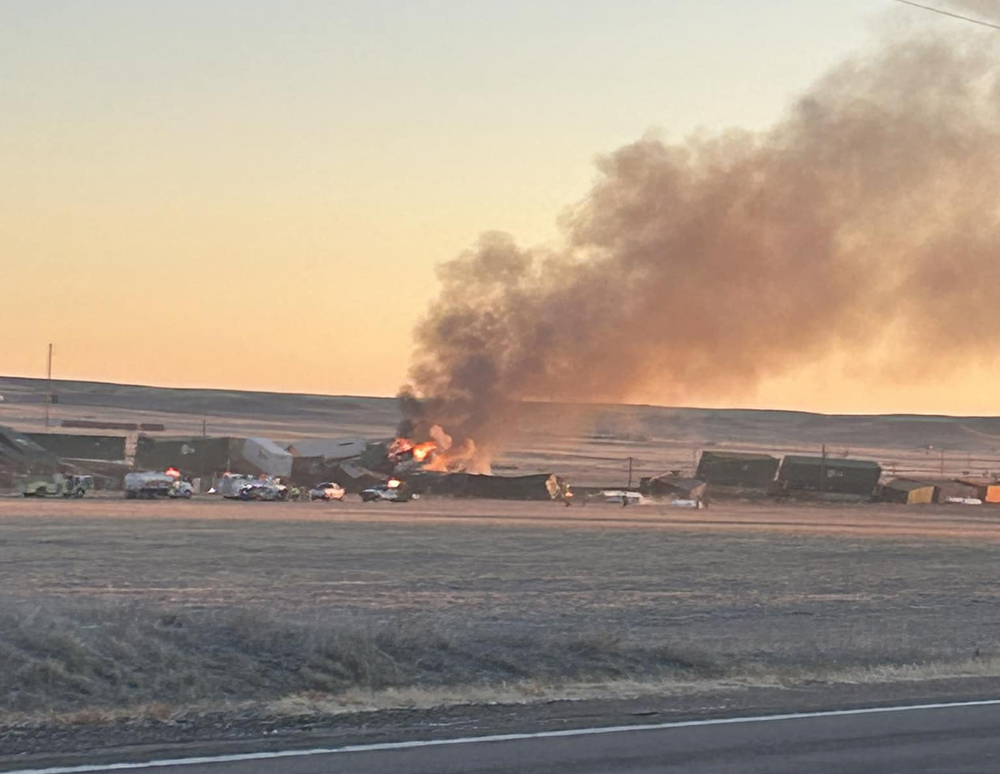 Burning containers at site of train derailment