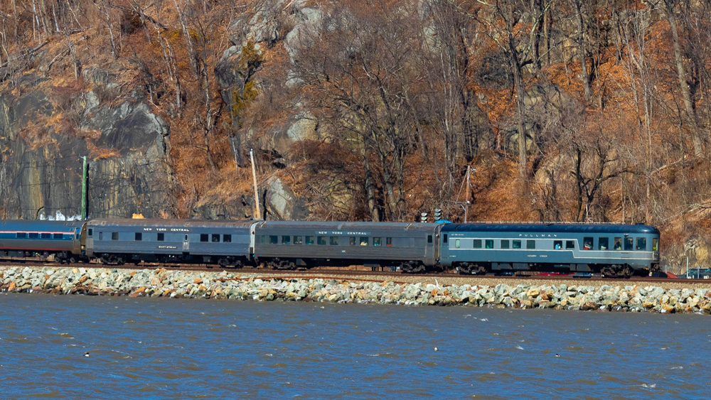Heritage passenger cars on back of Amtrak train