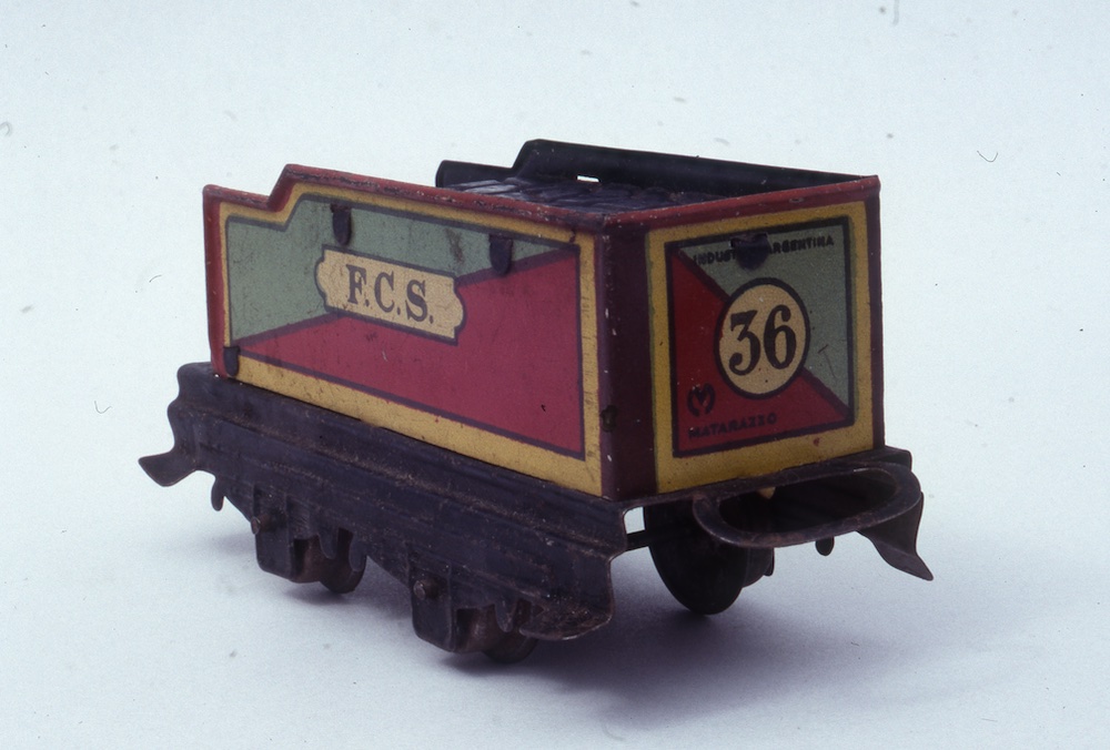 colorful tinplate tender; Toy trains in Argentina
