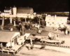 Black and white image on toy train layout with siding