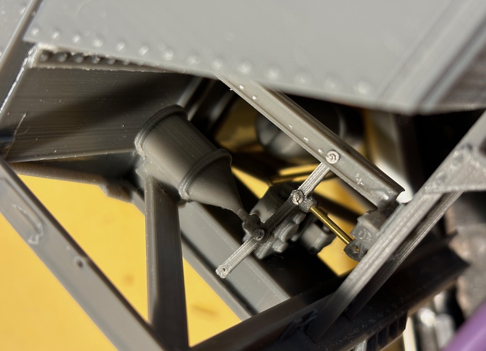 close up of partially assembled hopper car underside