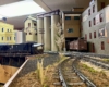 Main line with multiple industries in the background.